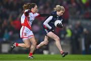 10 December 2022; Louise Ward of Kilkerrin-Clonberne in action against Cora Courtney of Donaghmoyne during the 2022 currentaccount.ie LGFA All-Ireland Senior Club Football Championship Final match between Donaghmoyne of Monaghan, and Kilkerrin-Clonberne of Galway at Croke Park in Dublin. Photo by Ben McShane/Sportsfile
