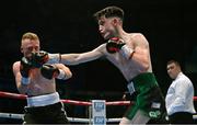10 December 2022; Conor Quinn, right, and Stephen Jackson during their flyweight bout at the SSE Arena in Belfast. Photo by Ramsey Cardy/Sportsfile