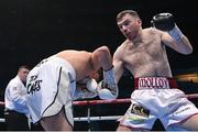 10 December 2022; Kieran Molloy, right, and Alexander Zeledon during their super-welterweight bout at the SSE Arena in Belfast. Photo by Ramsey Cardy/Sportsfile