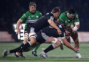 10 December 2022; Denis Buckley of Connacht is tackled by Marcus Tiffen, left, and Josh Peters of Newcastle Falcons during the EPCR Challenge Cup Pool A Round 1 match between Connacht and Newcastle Falcons at The Sportsground in Galway. Photo by Seb Daly/Sportsfile