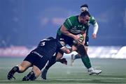 10 December 2022; Peter Dooley of Connacht is tackled by Mark Tampin of Newcastle Falcons during the EPCR Challenge Cup Pool A Round 1 match between Connacht and Newcastle Falcons at The Sportsground in Galway. Photo by Seb Daly/Sportsfile