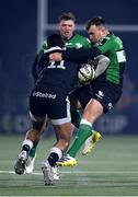 10 December 2022; Nathan Earle of Newcastle Falcons is tackled by David Hawkshaw of Connacht during the EPCR Challenge Cup Pool A Round 1 match between Connacht and Newcastle Falcons at The Sportsground in Galway. Photo by Seb Daly/Sportsfile