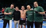 10 December 2022; Michael Conlan and his team after defeating Karim Guerfi in the first round of their featherweight bout at the SSE Arena in Belfast. Photo by Ramsey Cardy/Sportsfile
