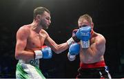 10 December 2022; Sean McComb, left, and Zsolt Osadan during their WBO European Super-Lightweight title bout at the SSE Arena in Belfast. Photo by Ramsey Cardy/Sportsfile
