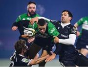 10 December 2022; Adam Byrne of Connacht is tackled by Sam Stuart, left, and Matias Moroni of Newcastle Falcons during the EPCR Challenge Cup Pool A Round 1 match between Connacht and Newcastle Falcons at The Sportsground in Galway. Photo by Seb Daly/Sportsfile