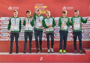 11 December 2022; The Ireland U20 men's team from left, Dean Casey, Jonas Stafford, Mark Hanrahan, Sean McGinley, Nicholas Griggs, and Callum Morgan, collect a silver medal after competing in the U20 men's 6000m during the SPAR European Cross Country Championships at Piemonte-La Mandria Park in Turin, Italy. Photo by Sam Barnes/Sportsfile