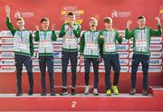 11 December 2022; The Ireland U20 men's team from left, Dean Casey, Jonas Stafford, Mark Hanrahan, Sean McGinley, Nicholas Griggs, and Callum Morgan, collect a silver medal after competing in the U20 men's 6000m during the SPAR European Cross Country Championships at Piemonte-La Mandria Park in Turin, Italy. Photo by Sam Barnes/Sportsfile