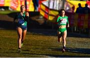 11 December 2022; Nadia Power of Ireland, left, competing in the 4x1500m mixed relay during the SPAR European Cross Country Championships at Piemonte-La Mandria Park in Turin, Italy. Photo by Sam Barnes/Sportsfile