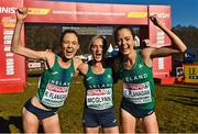 11 December 2022; Runners from left, Roisin Flanagan, Ann-Marie McGlynn, and Eilish Flanagan, celebrate after winning bronze in the senior women's 8000m during the SPAR European Cross Country Championships at Piemonte-La Mandria Park in Turin, Italy. Photo by Sam Barnes/Sportsfile