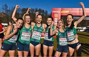 11 December 2022; Runners from left, Michelle Finn, Mary Mulhare, Eilish Flanagan, Aoibhe Richardson, Ann-Marie McGlynn, and Roisin Flanagan, celebrate after winning bronze in the senior women's 8000m during the SPAR European Cross Country Championships at Piemonte-La Mandria Park in Turin, Italy. Photo by Sam Barnes/Sportsfile