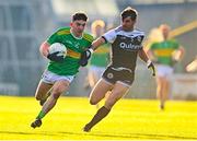11 December 2022; Conleth McGuckian of Glen in action against Niall Branagan of Kilcoo during the AIB Ulster GAA Football Senior Club Championship Final match between Glen Watty Graham's of Derry and Kilcoo of Down at the Athletics Grounds in Armagh. Photo by Ben McShane/Sportsfile