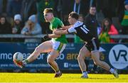 11 December 2022; Ethan Doherty of Glen in action against Ceilum Doherty of Kilcoo during the AIB Ulster GAA Football Senior Club Championship Final match between Glen Watty Graham's of Derry and Kilcoo of Down at the Athletics Grounds in Armagh. Photo by Ben McShane/Sportsfile