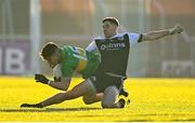 11 December 2022; Conleth McGuckian of Glen is tackled by Darryl Branagan of Kilcoo during the AIB Ulster GAA Football Senior Club Championship Final match between Glen Watty Graham's of Derry and Kilcoo of Down at the Athletics Grounds in Armagh. Photo by Ben McShane/Sportsfile