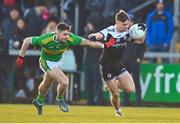 11 December 2022; Ceilum Doherty of Kilcoo in action against Danny Tallon of Glen during the AIB Ulster GAA Football Senior Club Championship Final match between Glen Watty Graham's of Derry and Kilcoo of Down at the Athletics Grounds in Armagh. Photo by Ben McShane/Sportsfile