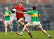11 December 2022; Paddy Sheehan of Fossa in action against Brian Hinchion of Kilmurry during the AIB Munster GAA Football Junior Club Championship Final match between Fossa and Kilmurry at Mallow GAA Sports Complex in Cork. Photo by Michael P Ryan/Sportsfile
