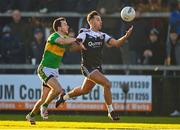 11 December 2022; Ryan Johnston of Kilcoo in action against Michael Warnock of Glen during the AIB Ulster GAA Football Senior Club Championship Final match between Glen Watty Graham's of Derry and Kilcoo of Down at the Athletics Grounds in Armagh. Photo by Ben McShane/Sportsfile
