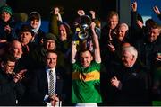 11 December 2022; Glen captain Connor Carville lifts the cup after the AIB Ulster GAA Football Senior Club Championship Final match between Glen Watty Graham's of Derry and Kilcoo of Down at the Athletics Grounds in Armagh. Photo by Ben McShane/Sportsfile