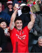 11 December 2022; Fossa captain Paudie Clifford lifts the cup after his side's victory in the AIB Munster GAA Football Junior Club Championship Final match between Fossa and Kilmurry at Mallow GAA Sports Complex in Cork. Photo by Michael P Ryan/Sportsfile