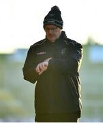 11 December 2022; Glen manager Malachy O'Rourke checks his watch late on in the AIB Ulster GAA Football Senior Club Championship Final match between Glen Watty Graham's of Derry and Kilcoo of Down at the Athletics Grounds in Armagh. Photo by Ben McShane/Sportsfile