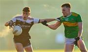 11 December 2022; Shealan Johnston of Kilcoo in action against Ethan Doherty of Glen during the AIB Ulster GAA Football Senior Club Championship Final match between Glen Watty Graham's of Derry and Kilcoo of Down at the Athletics Grounds in Armagh. Photo by Ben McShane/Sportsfile