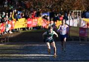 11 December 2022; Nicholas Griggs of Ireland, left, stumbles on his way to finishing second in the U20 men's 6000m, finishing behind Will Barnicoat of Great Britain, right, during the SPAR European Cross Country Championships at Piemonte-La Mandria Park in Turin, Italy. Photo by Thomas Windestam/Sportsfile