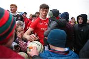 11 December 2022; David Clifford of Fossa signs autographs after the AIB Munster GAA Football Junior Club Championship Final match between Fossa and Kilmurry at Mallow GAA Sports Complex in Cork. Photo by Michael P Ryan/Sportsfile