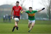 11 December 2022; Fintan Coffey of Fossa in action against Gearoid O'Mahony of Kilmurry during the AIB Munster GAA Football Junior Club Championship Final match between Fossa and Kilmurry at Mallow GAA Sports Complex in Cork. Photo by Michael P Ryan/Sportsfile