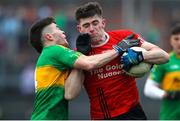 11 December 2022; Matt Rennie of Fossa in action against Gearoid O'Mahony of Kilmurry during the AIB Munster GAA Football Junior Club Championship Final match between Fossa and Kilmurry at Mallow GAA Sports Complex in Cork. Photo by Michael P Ryan/Sportsfile