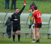 11 December 2022; Fionn Warren of Kilmurry is shown a red card by referee Niall Quinn during the AIB Munster GAA Football Junior Club Championship Final match between Fossa and Kilmurry at Mallow GAA Sports Complex in Cork. Photo by Michael P Ryan/Sportsfile