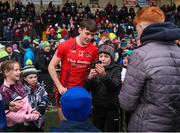11 December 2022; David Clifford of Fossa poses for pictures with supporters after the AIB Munster GAA Football Junior Club Championship Final match between Fossa and Kilmurry at Mallow GAA Sports Complex in Cork. Photo by Michael P Ryan/Sportsfile