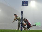 11 December 2022; Matthis Lebel of Toulouse scores his side's first try despite the tackle of Shane Daly of Munster during the Heineken Champions Cup Pool B Round 1 match between Munster and Toulouse at Thomond Park in Limerick. Photo by Harry Murphy/Sportsfile
