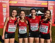 11 December 2022; The Denmark senior women's 8000m team of Annie Saugstrup, Juliane Hvid, Carolien Millenaar and Nanna Bové after the race during the SPAR European Cross Country Championships at Piemonte-La Mandria Park in Turin, Italy. Photo by Sam Barnes/Sportsfile