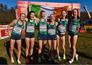 11 December 2022; Ireland's Michelle Finn, Aoibhe Richardson, Mary Mulhare, Ann-Marie McGlynn, and Roisin Flanagan, Eilish Flanagan celebrate after winning bronze in the senior women's 8000m during the SPAR European Cross Country Championships at Piemonte-La Mandria Park in Turin, Italy. Photo by Sam Barnes/Sportsfile