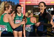 11 December 2022; Ireland athletes, from left,  Mary Mulhare, Aoibhe Richardson, Ann Marie McGlynn and Roisin Flanagan celebrate after winning bronze in the senior women's 8000m during the SPAR European Cross Country Championships at Piemonte-La Mandria Park in Turin, Italy. Photo by Sam Barnes/Sportsfile