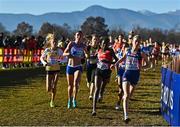 11 December 2022; Karoline Bjerkeli Grøvdal of Norway, right, leads the field on her way to winning the senior women's 8000m during the SPAR European Cross Country Championships at Piemonte-La Mandria Park in Turin, Italy. Photo by Sam Barnes/Sportsfile