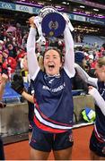 10 December 2022; Chloe Costello of Kilkerrin-Clonberne celebrates with the trophy following her side's victory in the 2022 currentaccount.ie LGFA All-Ireland Senior Club Football Championship Final match between Donaghmoyne of Monaghan, and Kilkerrin-Clonberne of Galway at Croke Park in Dublin. Photo by Tyler Miller/Sportsfile
