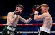 10 December 2022; Stephen Jackson, right, and Conor Quinn during their flyweight bout at the SSE Arena in Belfast. Photo by Ramsey Cardy/Sportsfile