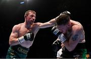 10 December 2022; Graham McCormack, right, and Fearghus Quinn during their BUI Celtic Middleweight title bout at the SSE Arena in Belfast. Photo by Ramsey Cardy/Sportsfile