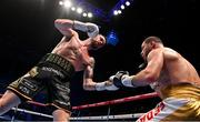10 December 2022; Padraig McCrory, left, and Dmytro Fedas during their light-heavyweight bout at the SSE Arena in Belfast. Photo by Ramsey Cardy/Sportsfile