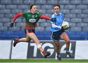 10 December 2022; Clare Farrell of Longford Slashers and Chloe Gunn of Mullinahone during the 2022 currentaccount.ie LGFA All-Ireland Intermediate Club Football Championship Final match between Longford Slashers of Longford and Mullinahone of Tipperary at Croke Park in Dublin. Photo by Ben McShane/Sportsfile