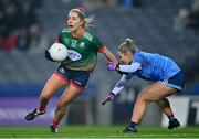 10 December 2022; Aoibhe O'Shea of Mullinahone and Laura Kenny of Longford Slashers during the 2022 currentaccount.ie LGFA All-Ireland Intermediate Club Football Championship Final match between Longford Slashers of Longford and Mullinahone of Tipperary at Croke Park in Dublin. Photo by Ben McShane/Sportsfile