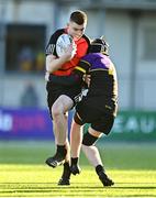 15 December 2022; Evan O'Connor of St Mary's is tackled by James Cluskey of Ardgillian during the Bank of Ireland Leinster Rugby Pat Rossiter Cup (JCT) match between St. Mary's CBS, Portlaoise and Ardgillan Community College at Energia Park in Dublin. Photo by Ben McShane/Sportsfile