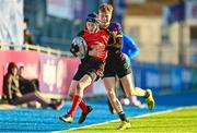 15 December 2022; Daniel Downey of St Mary's is tackled by Julian Kearney of Ardgillian during the Bank of Ireland Leinster Rugby Pat Rossiter Cup (JCT) match between St. Mary's CBS, Portlaoise and Ardgillan Community College at Energia Park in Dublin. Photo by Ben McShane/Sportsfile