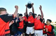 15 December 2022; St Mary's captain Cian Butler lifts the Pat Rossiter cup after the Bank of Ireland Leinster Rugby Pat Rossiter Cup (JCT) match between St. Mary's CBS, Portlaoise and Ardgillan Community College at Energia Park in Dublin. Photo by Ben McShane/Sportsfile