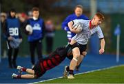 15 December 2022; Calum Murphy of Kildare Town CS is tackled by Páidí Gorman of St Mary's-Edenderry during the Bank of Ireland Leinster Rugby Division 3A SCT Development Shield match between Kildare Town Community College and St. Mary's Secondary School, Edenderry at Energia Park in Dublin. Photo by Ben McShane/Sportsfile