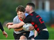 15 December 2022; Oisin Carroll of Kildare Town CS is tackled by Joshua McGlade of St Mary's-Edenderry during the Bank of Ireland Leinster Rugby Division 3A SCT Development Shield match between Kildare Town Community College and St. Mary's Secondary School, Edenderry at Energia Park in Dublin. Photo by Ben McShane/Sportsfile