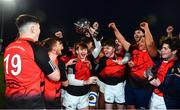 15 December 2022; St Mary's captain Matthew Coonan lifts the cup after the Bank of Ireland Leinster Rugby Anne McInerny Cup (SCT) match between St. Mary's CBS, Portlaoise and Ardgillan Community College at Energia Park in Dublin. Photo by Ben McShane/Sportsfile