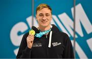 15 December 2022; Shane Ryan of Wexford SC with his gold medal after winning the 50m backstroke final during day one of the Irish National Winter Swimming Championships 2022 at the National Aquatic Centre, on the Sport Ireland Campus, in Dublin. Photo by David Fitzgerald/Sportsfile