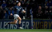 16 December 2022; James Lowe of Leinster on his way to scoring his side's first try during the Heineken Champions Cup Pool A Round 2 match between Leinster and Gloucester at the RDS Arena in Dublin. Photo by Seb Daly/Sportsfile