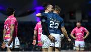 16 December 2022; James Lowe of Leinster celebrates with teammate Jordan Larmour, 23, after scoring his side's seventh try during the Heineken Champions Cup Pool A Round 2 match between Leinster and Gloucester at the RDS Arena in Dublin. Photo by Sam Barnes/Sportsfile